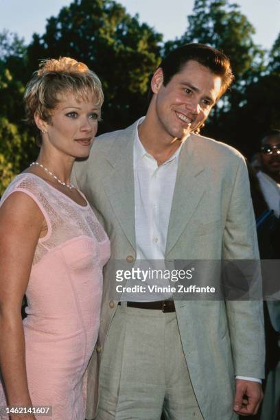 Lauren Holly and actor Jim Carrey attend "The Nutty Professor" Universal City Premiere at the Universal Amphitheatre in Universal City, California,...