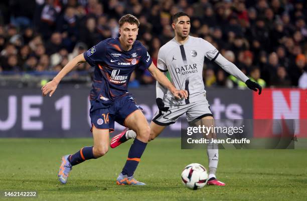 Maxime Esteve of Montpellier, Achraf Hakimi of PSG during the Ligue 1 match between Montpellier HSC and Paris Saint-Germain at Stade de la Mosson on...