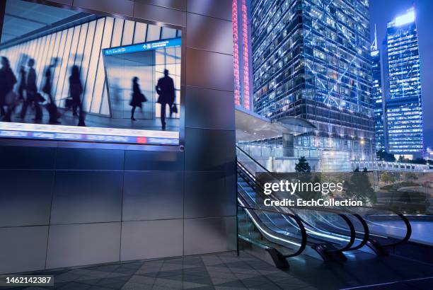 central business district of hong kong with large led display at dusk - commercial building people stockfoto's en -beelden