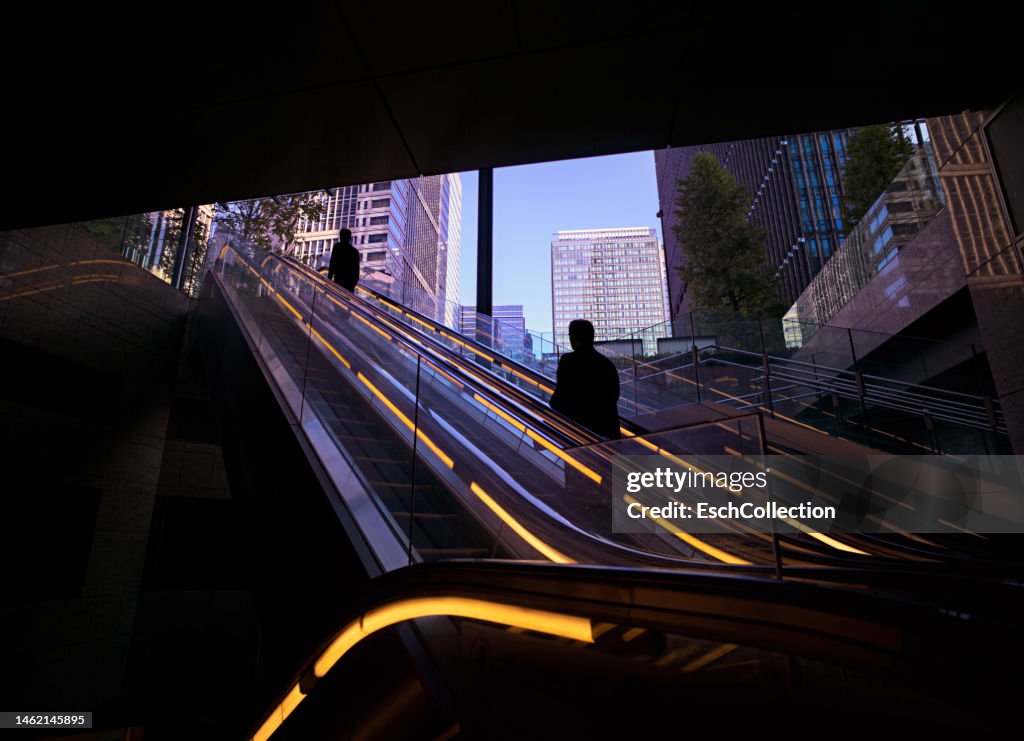 Morning commuters arriving at Marunouchi business district in Tokyo, Japan