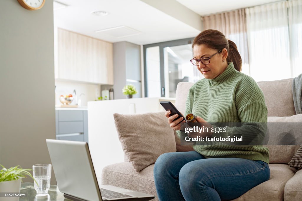Woman using phone searching medicine information