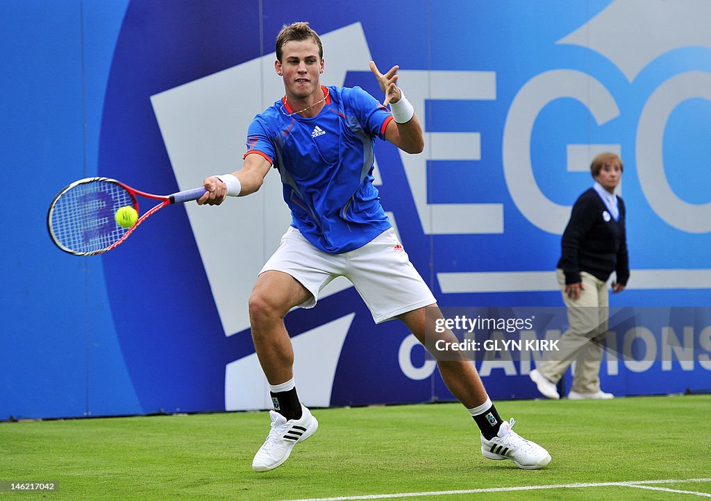 Vasek Pospisil of Canada returns against