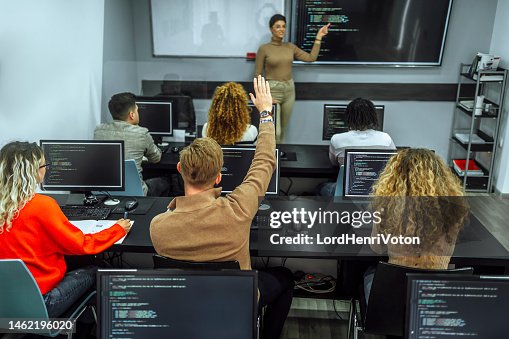 Female Educator And Students In Programming School High-Res Stock Photo ...