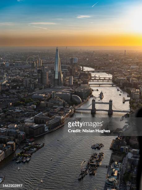 aerial view of london at sunset looking west over the shard - waterloo railway station london stock pictures, royalty-free photos & images
