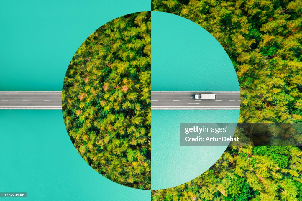 Creative picture montage with a circle shape, connecting an elevated road with a green forest, evoking sustainable development and fair use of planetary resources.