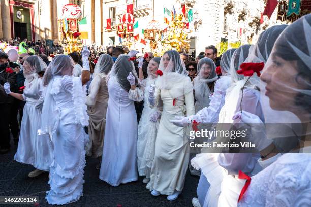 The 'Ntuppatedde, a group of young girls dance during the candle procession. The figure of the 'Ntuppatedde is linked to Saint Agatha in that they...