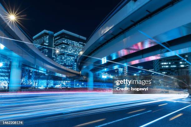 light trails on the urban road in tokyo - isogawyi stock pictures, royalty-free photos & images