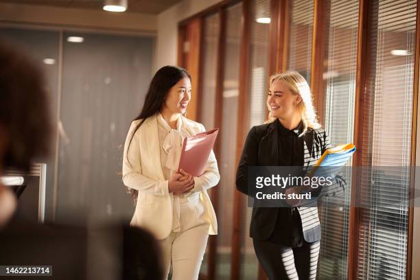 law firm intern with manager - employment law stock pictures, royalty-free photos & images