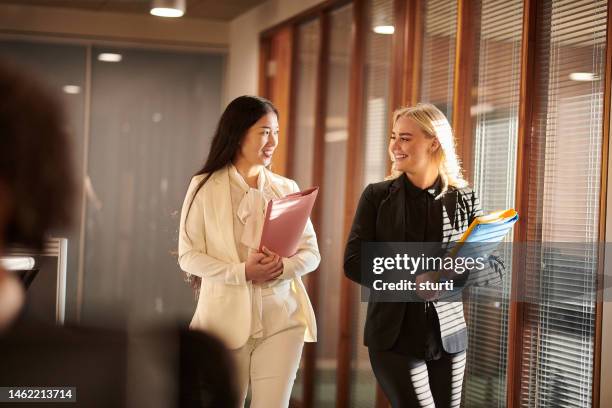 law firm intern with manager - british blonde stock pictures, royalty-free photos & images