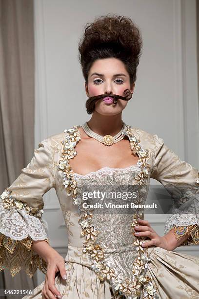 a woman in historical costume - beehive hair stock pictures, royalty-free photos & images