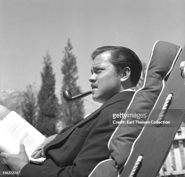 American actor and filmmaker Orson Welles working on a script in Los Angeles, California, circa 1940.