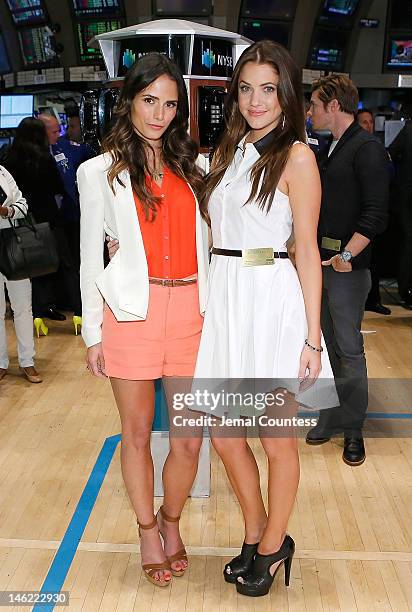 Actors Jordana Brewster and Julie Gonzalo of the cast of the new series "Dallas" visit The New York Stock Exchange on June 12, 2012 in New York City.