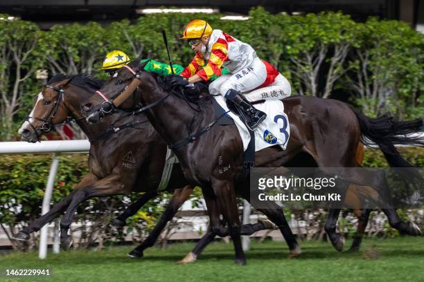 Jockey Zac Purton riding Hoss wins the Race 5 Stubbs Handicap at Happy Valley Racecourse on February 1, 2023 in Hong Kong.
