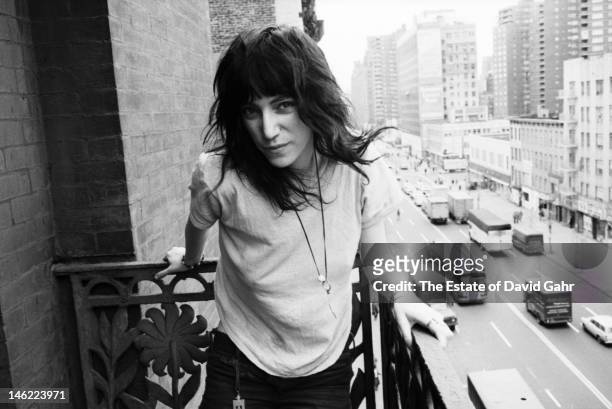 Poet and singer Patti Smith poses for a portrait on May 4, 1971 on a balcony at the Chelsea Hotel in New York City, New York.