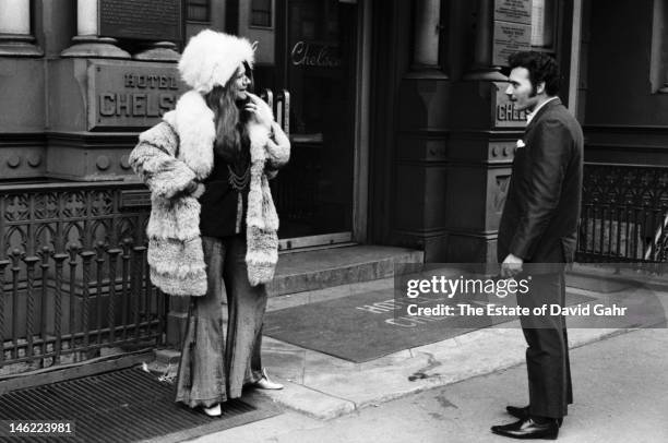 Blues singer Janis Joplin poses for a portrait on March 3, 1969 outside of the entrance to the Chelsea Hotel in New York City, New York.