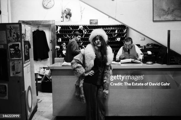 Blues singer Janis Joplin poses for a portrait on March 3, 1969 in the lobby of the Chelsea Hotel in New York City, New York.