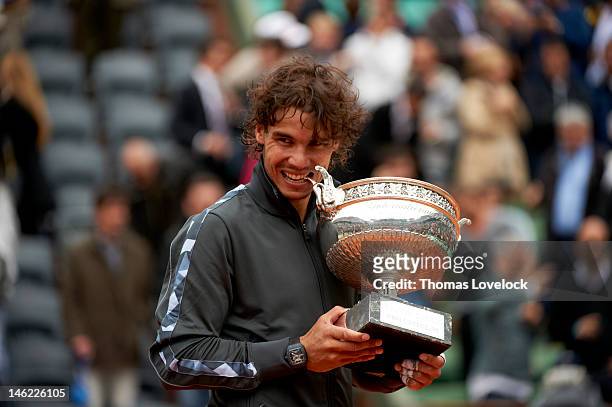 Spain Rafael Nadal victorious with Coupe des Mousquetaires trophy after winning Men's Final vs Serbia Novak Djokovic at Stade Roland Garros. The...