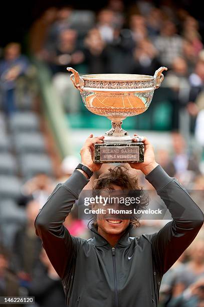 Spain Rafael Nadal victorious with Coupe des Mousquetaires trophy after winning Men's Final vs Serbia Novak Djokovic at Stade Roland Garros. The...