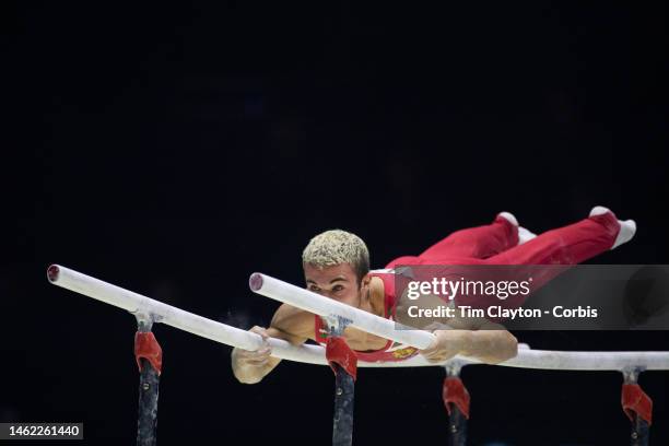 October 31: David Huddleston of Bulgaria performs his parallel bars routine during Men's qualifications at the World Gymnastics...