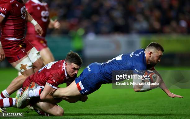 Andy Uren of Bristol is tackled by George Ford of Sale Sharks during the Premiership Rugby Cup match between Bristol Bears and Sale Sharks at Ashton...