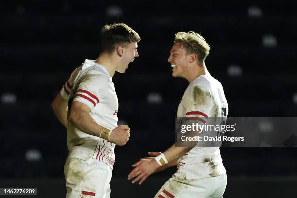 Tobias Elliott of England celebrates after scoring their side's sixth try with Sam Harris during the U20 Six Nations Rugby match between England and...