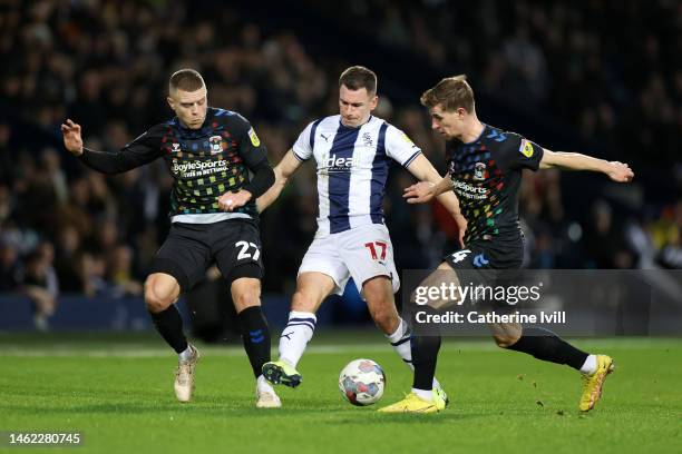 Jed Wallace of West Bromwich Albion is put under pressure by Jake Bidwell and Ben Sheaf of Coventry City during the Sky Bet Championship between West...