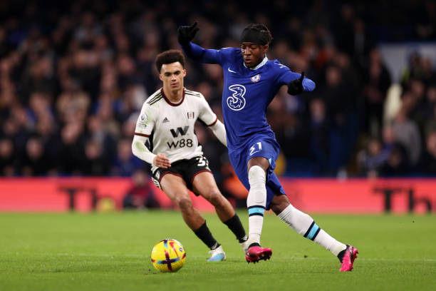 Noni Madueke of Chelsea runs with the ball during the Premier League match between Chelsea FC and Fulham FC at Stamford Bridge on February 03, 2023...
