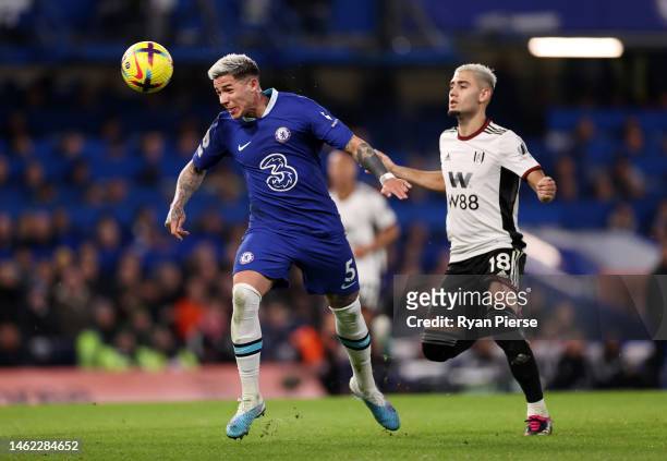 Enzo Fernandez of Chelsea battles for possession with Andreas Pereira of Fulham during the Premier League match between Chelsea FC and Fulham FC at...
