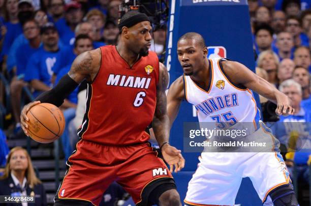 LeBron James of the Miami Heat posts up Kevin Durant of the Oklahoma City Thunder in the first quarter in Game One of the 2012 NBA Finals at...