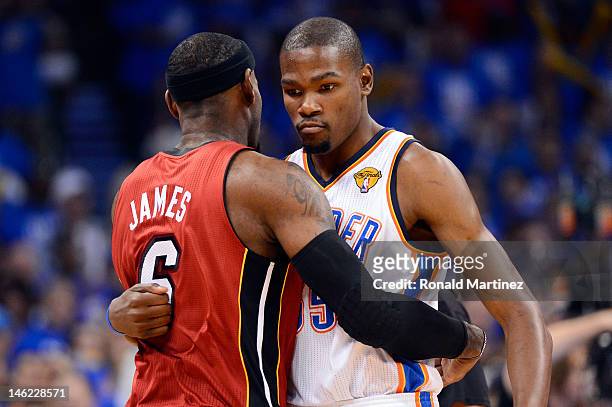 LeBron James of the Miami Heat hugs Kevin Durant of the Oklahoma City Thunder before the start of Game One of the 2012 NBA Finals at Chesapeake...