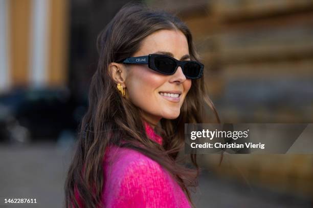 Nina Sandbech wears oversized strong shoulder line jacket in pink, earrings, sunglasses Celine outside Gestuz during the Copenhagen Fashion Week...
