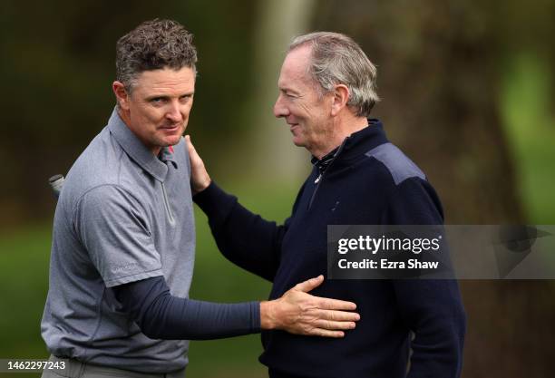 Justin Rose of England with his playing partner James Gorman finish their round during the second round of the AT&T Pebble Beach Pro-Am at Spyglass...