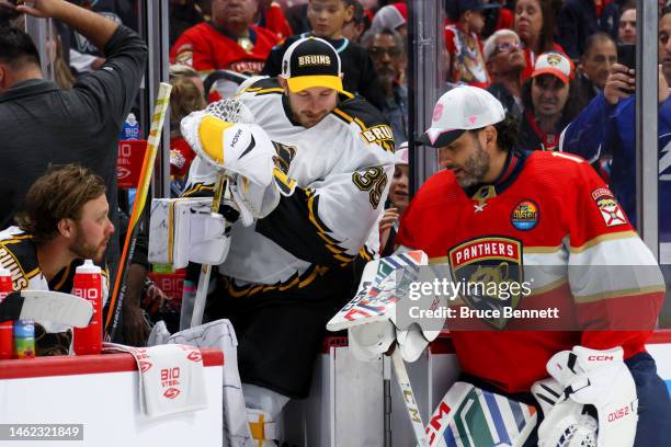 Linus Ullmark of the Boston Bruins talks with former goalie Roberto Luongo of the Florida Panthers prior to the 2023 NHL All-Star Skills Competition...