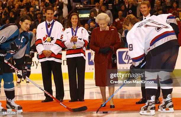 Canadian hockey great Wayne Gretzky , Vancouver Canucks, Ed Jovanovski and Canadian Womens Olympic winter games gold medal hockey team captain Cassie...