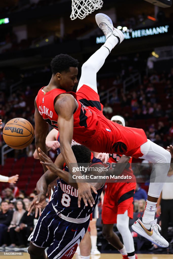 Houston Rockets Toronto Raptors Christian Koloko of the Toronto Raptors collides with Jae'Sean Tate ...