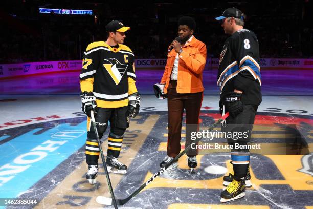 Former player P. K. Subban talks with Sidney Crosby of the Pittsburgh Penguins and Alex Ovechkin of the Washington Capitals during the 2023 NHL...