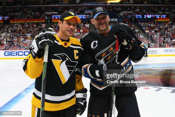 Sidney Crosby of the Pittsburgh Penguins poses with Alex Ovechkin of the Washington Capitals during the 2023 NHL All-Star Skills Competition at FLA...