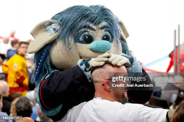 Buoy the Troll of the Seattle Kraken jokes with a fan during the 2023 NHL All-Star Skills Competition at FLA Live Arena on February 03, 2023 in...