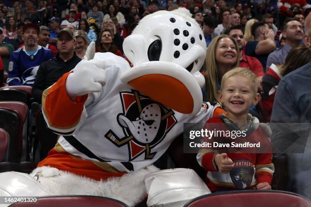 Wild Wing of the Anaheim Ducks interacts with a fan during the Discover NHL Tendy Tandem event during the 2023 NHL All-Star Skills Competition at FLA...