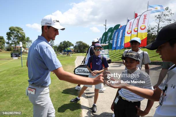 Mac Meissner of the United States gives the ball as a gift to the fans on the 18th hole during the second round of The Panama Championship at Club de...