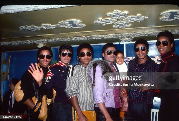 View of members of American Pop & R&B group the Jacksons, with actor Emmanuel Lewis , during a press conference to announce the group's 'Victory'...