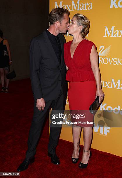 Actress Christina Applegate and musician Martyn LeNoble arrive at the 2012 Women In Film Crystal + Lucy Awards at The Beverly Hilton Hotel on June...