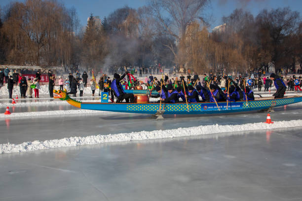 CHN: Ice Dragon Boat Race Held In Jilin