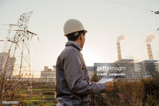 young engineers working in power plants work with confidence - coal computer stock pictures, royalty-free photos & images