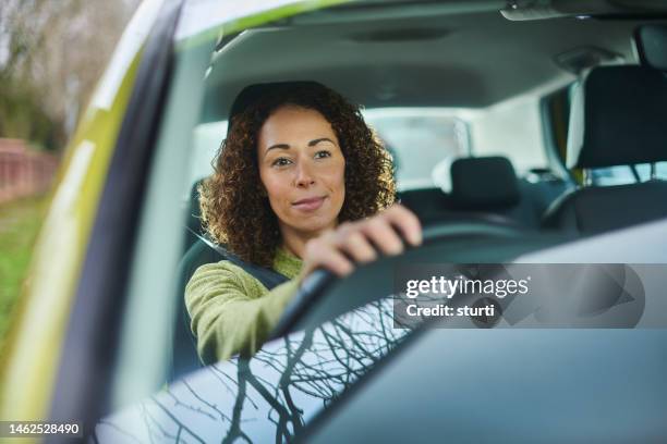 contented driver - carefree driving stock pictures, royalty-free photos & images