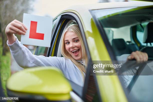 learner driver portrait - driving instructor stock pictures, royalty-free photos & images