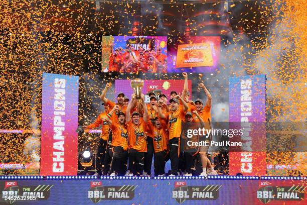 The Scorchers celebrate with the trophy after winning the Men's Big Bash League Final match between the Perth Scorchers and the Brisbane Heat at...