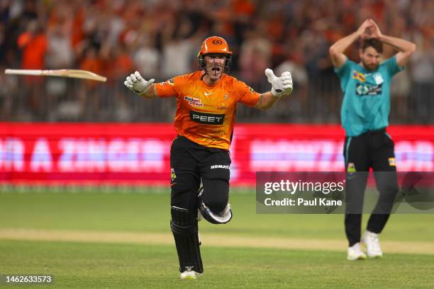 Nick Hobson of the Scorchers celebrates after hitting the winning runs during the Men's Big Bash League Final match between the Perth Scorchers and...