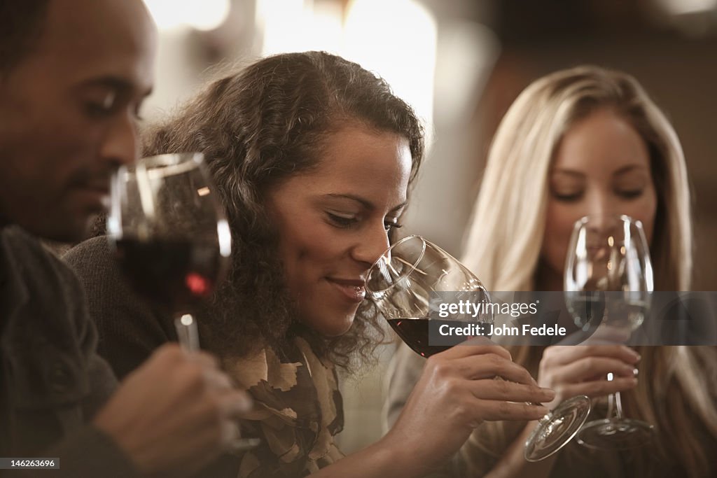 Friends tasting wine together