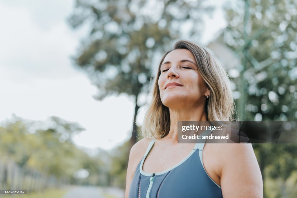 Portrait of a woman breathing fresh air